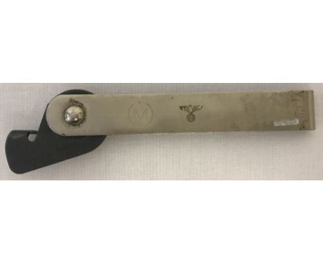 WW2 Style German Army Can Opener with Eagle Markings.Approx. 10cm wide.