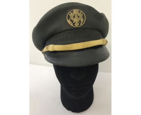 Vietnam era US Army dress cap. Green felt with gold band and brass cap badge.