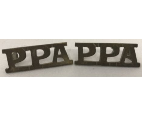 WW2 style P.P.A (Popski’s Private Army) brass shoulder titles.