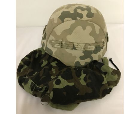 Ukrainian army kevlar helmet with 2 canvas covers.Brought back from Iraq.Sold on behalf of a private collector.