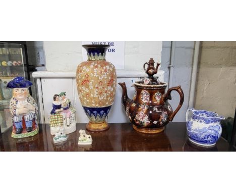 A Royal Doulton baluster vase 35cm (foot repaired), Bargeware teapot 31cm (handle to lid repaired), three Staffordshire figur