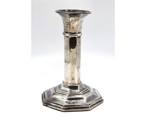 A single silver Dorrick column candlestick, Birmingham 1907 with a plaster base. Reference number R2495330. 13cm. 307gms all 