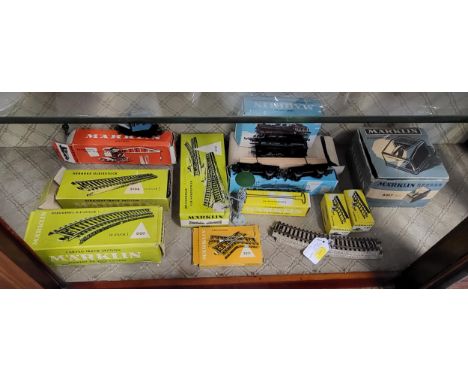 Marklin H0 gauge 3000 0-6-0 tank Locomotive, crane wagons, Plank wagon, transformer, track, and 7047 Station Lamp in boxes. 