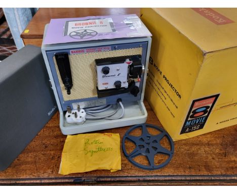 A Kodak Brownie 8 movie projector in original case with original leaflet and outer box. Model number A-15G. 