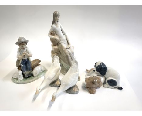 Two Nao geese, puppies group, and two figures 11cm to 25cm (5)Excellent condition, however, the girl holding the urn- the urn