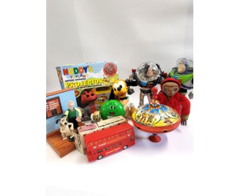An EINCO friction-powered double decker bus in box, Noddy's Projector, a tinplate spinning top, Buzz Lightyear, and other fig