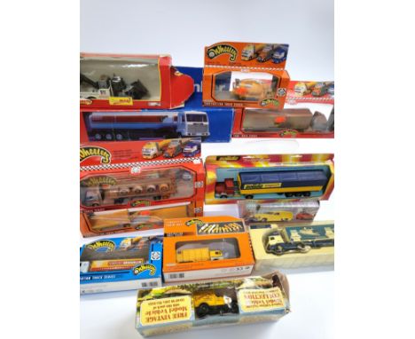 Twelve diecast commercial vehicles by various makers including Solido Majorette, Mint &amp; Boxed, and Kentoys. (12) 