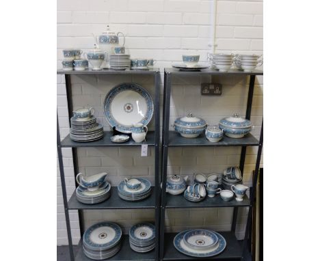 An extensive Wedgwood 'Florentine' patterned dinner service comprising coffee pot, fourteen coffee cans, fourteen saucers, tw