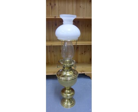 A brass Hinks & Son oil lamp with opaque glass shade, 69cm high
