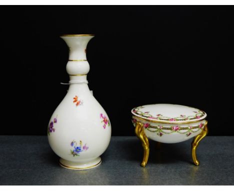 A Meissen white glazed vase with floral sprays together with a M. Raynaud Limoges circular pot and cover on three gilt out sw