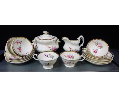 A 19th century English porcelain floral decorated tea set comprising nine cups, nine saucers,  milk jug and a sucrier (a lot)