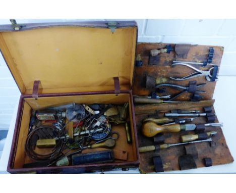A vintage leather case piano tuners tool kit containing miscellaneous tools etc., (a lot) 