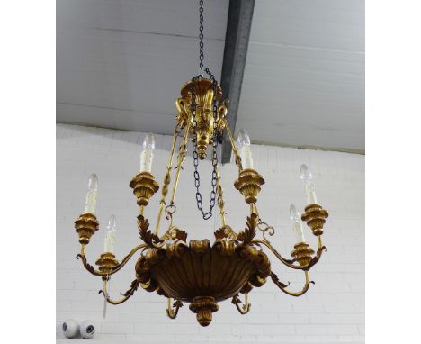 A giltwood eight-branch light fitting with swan neck ceiling rose