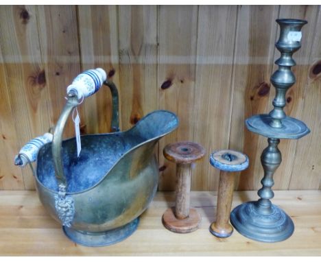 Brass wares to include a coal bucket, candlestick and two wooden bobbins (mixed lot) 