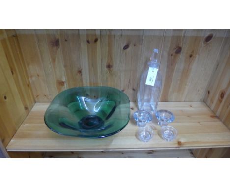 An Orrefors green glass bowl on circular footrim, 35cm diameter, together with an Orrefors clear glass decanter and stopper a