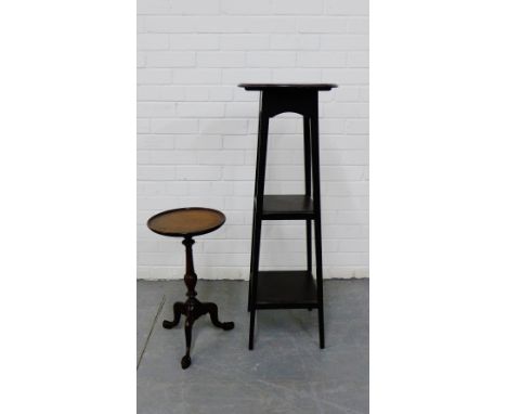 A mahogany wine table, the circular top on turned column and tripod supports with paw feet, together with an early 20th centu