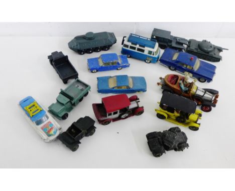 A carton containing vintage die cast cars etc., to include a Corgi toys Bluebird, Chitty Chitty Bang Bang and various German 