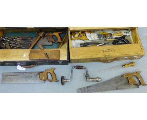Two wooden toolboxes each containing a selection of vintage woodworking tools to include saws and chisels, etc (a lot) 