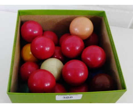 A carton containing vintage snooker balls 
