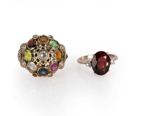 A Thai princess ring and a garnet ring, a gemstone set Thai princess ring,of tiered cluster form, with assorted gemstones to 