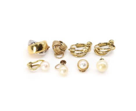 A group of single gold clip earrings, a single clip earring, stamped 750, tested as approximately 18ct gold, a single 9ct gol