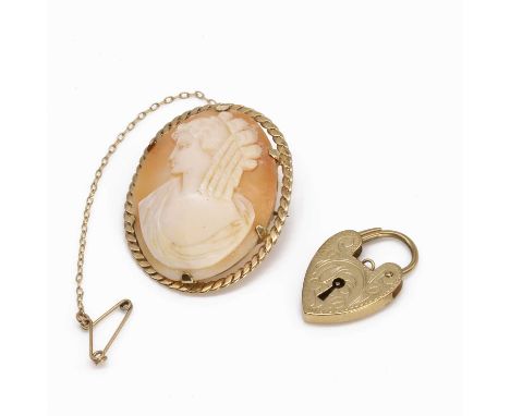 A 9ct gold shell cameo brooch and a heart shaped padlock, with an oval shell cameo depicting the profile of a lady in thought