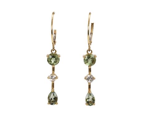 A pair of 9ct gold diamond and moldavite drop earrings, each composed of a round mixed cut moldavite, a round brilliant cut d