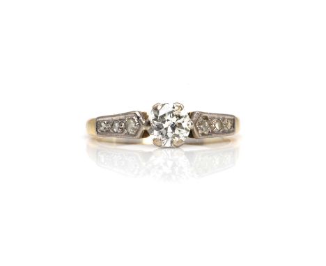 A single stone diamond ring with rose cut diamond shoulders,  the principal stone a transitional cut diamond, estimated as ap