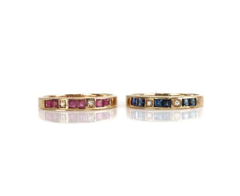 A set of two 9ct gold ruby, sapphire and diamond half eternity rings,  one channel set with pairs of calibre cut sapphires in