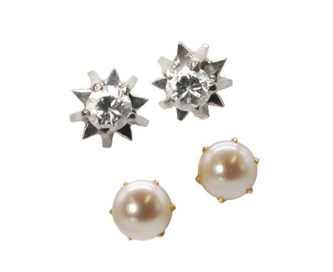 Two pairs of stud earrings, a pair of white gold diamond stud earrings, each with a round brilliant cut diamond, claw set to 