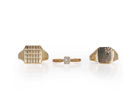 A small group of gold rings, a 9ct gold signet ring,the square head with an engraved grid, into tapered shoulders and a low D