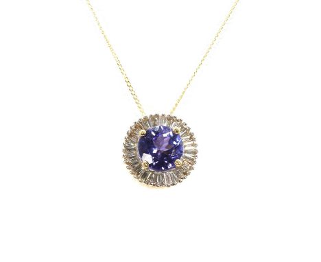 A tanzanite and diamond circular cluster pendant and chain, a central round cut tanzanite, 6mm diameter, to a surround of rad