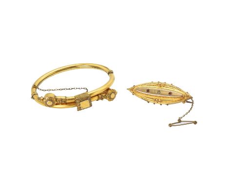 An Edwardian 9ct gold mourning brooch and a rolled gold bracelet, a boat shaped brooch, with granulations to the edges, to 'C