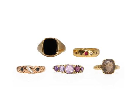 A group of five gemstone set rings, an 18ct gold ruby and diamond ringLondon 1894,a smoky quartz sing stone ring,stamped 18K,