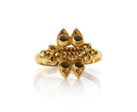 An Indian gold ring, with a central chain link panel, to a hollow faceted surround, into a D profile shank, stamped KDM22, te