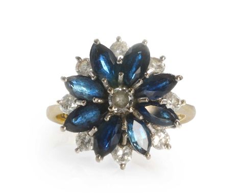 An 18ct gold sapphire and diamond floral cluster ring,  with a central round brilliant cut diamond, to a surround of marquise