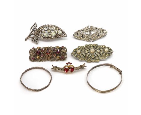 A group of early 20th century and later silver and costume jewellery, a paste double heart brooch, with two red heart cut pas