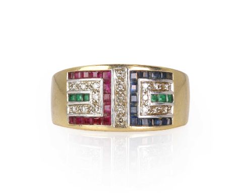 A 9ct gold emerald, ruby, sapphire and diamond ring,  set with a panel of calibre cut emeralds, rubies and sapphires, spaced 