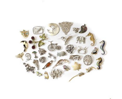 A collection of silver, bronze and costume brooches and pendants, to include a Modernist brooch, designed by Ernest Blyth for