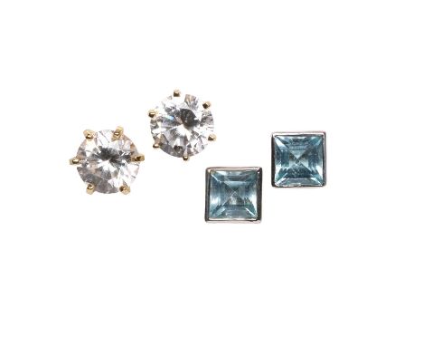 Two pairs of gem set stud earrings, a pair of 9ct white gold blue topaz earrings, with a square step cut topaz, bezel set to 