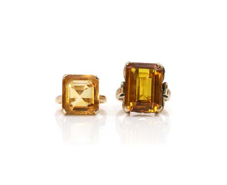 Two gem set single stone rings, a citrine single stone ring, with a rectangular step cut citrine, claw set to applied shoulde