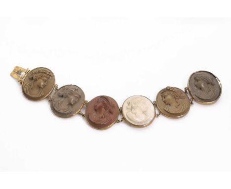 A Victorian lava cameo specimen bracelet, with a line of oval vari coloured lava cameos, 25mm x 30mm, each depicting a classi