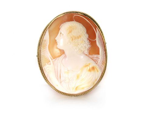 An antique shell cameo, an oval shell cameo depicting the Annunciation Angel, facing left, bezel set with a wire twist border