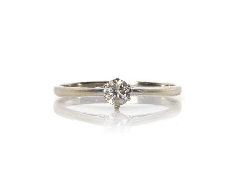 A 9ct white gold single stone diamond ring,  with a round brilliant cut diamond, claw set to chenier shoulders and a D profil