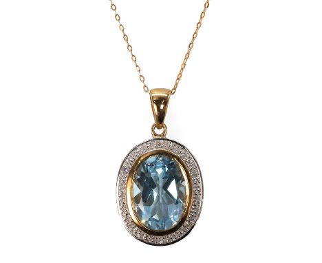 A 9ct gold topaz and diamond pendant and chain, an oval mixed cut blue topaz rub set to a raised collet, to a surround accent