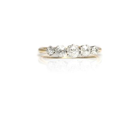 A fiive stone old cut diamond ring,  with four graduated old cut diamonds and a modern round brilliant diamond, claw set in w