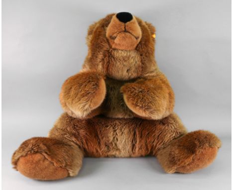 Steiff; a large brown bear, 80cm long, together with a Steiff Lama, 11cm long 92).
