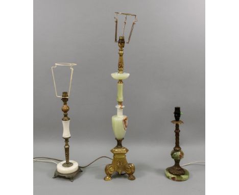 A green onyx marble and gilt metal pricket type altar candlestick table lamp, 72cm high, with shade and two others (3).