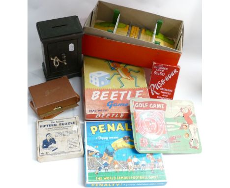 A collection of vintage toys: Including Hornby tin plate level crossing, tin plate safe, board games etc. (8)