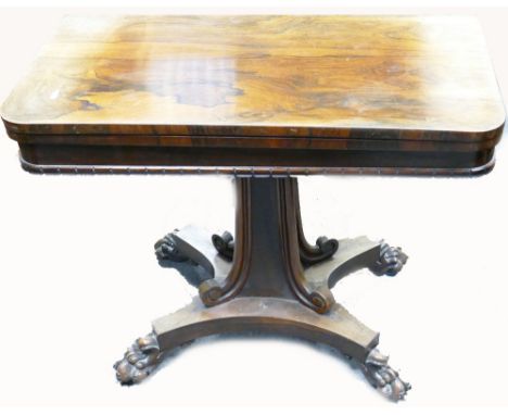 Victorian Rosewood fold over Card table: With lions paw feet, width 91cm, depth 46cm and height 74cm Condition Report: caster